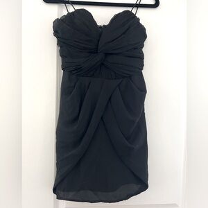 Size small strapless black mini dress with knot detailing in front
